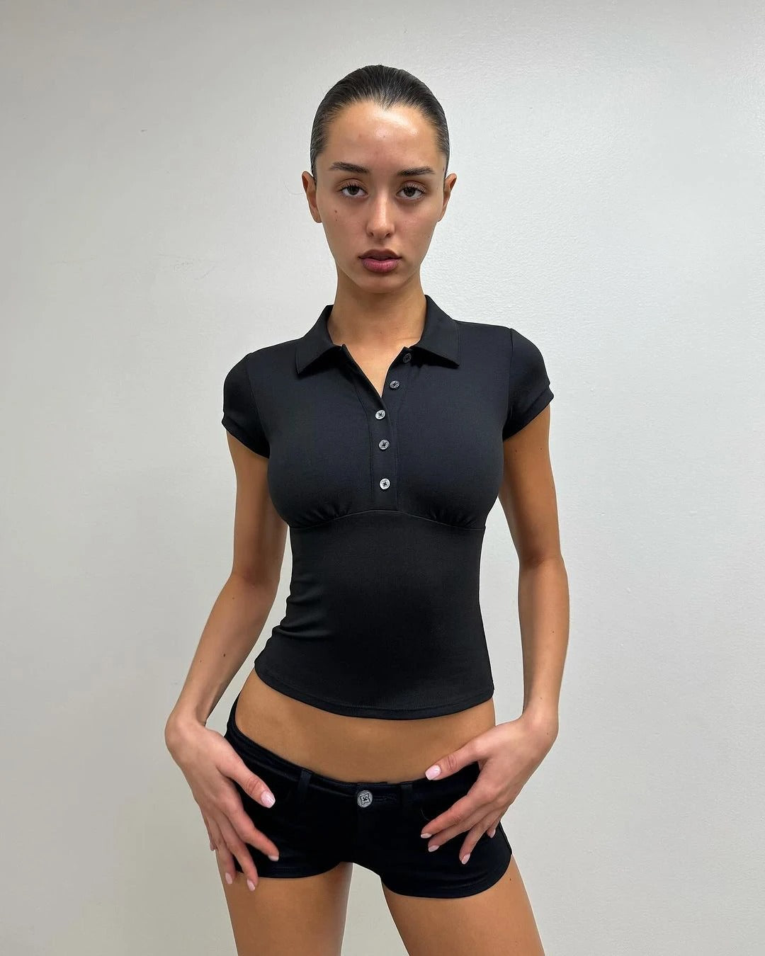 Women's Black Slim Polo Tee – Short Sleeve Cropped Top with Button Detail | Blanqor
