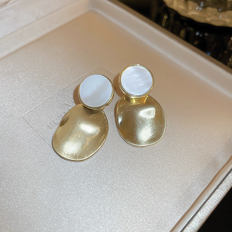 Golden Pleated Oval Stud Earrings with White Shell Pearl Accent | Blanqor