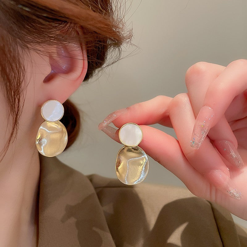 Golden Pleated Oval Stud Earrings with White Shell Pearl Accent | Blanqor