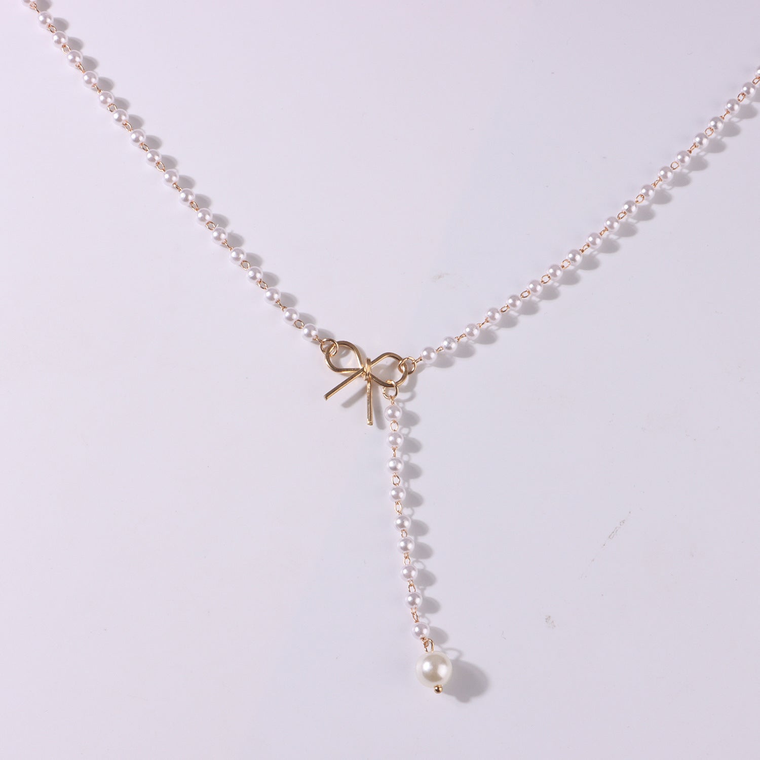 Gold Bow & Pearl Tassel Pendant Necklace Women’s Simple Charm | Blanqor